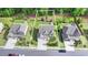 Aerial view of a well-situated home with a spacious lot, mature trees, and a convenient three-car garage at 13055 Fox Rd, Alpharetta, GA 30005