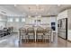 Gourmet kitchen with seating at the island at 13055 Fox Rd, Alpharetta, GA 30005
