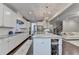 Spacious kitchen features large island with seating at 13055 Fox Rd, Alpharetta, GA 30005