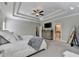 Expansive main bedroom featuring a trey ceiling, carpet, and a spacious layout, creating a comfortable retreat at 13055 Fox Rd, Alpharetta, GA 30005