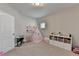 Bright playroom featuring a play tent, keyboard, bookcase and plenty of natural light at 13055 Fox Rd, Alpharetta, GA 30005