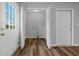 Bright laundry room with closet storage and vinyl floors at 140 Moseley Dr, Stockbridge, GA 30281