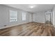 Bright living room with freshly painted walls and vinyl plank flooring at 140 Moseley Dr, Stockbridge, GA 30281