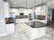 Spacious kitchen featuring granite countertops, white cabinetry, and stainless steel appliances at 232 Clubhouse Xing, Acworth, GA 30101