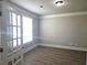 Bright office space with a French door entry, large window, and hard surface floors at 232 Clubhouse Xing, Acworth, GA 30101
