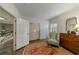 Bedroom featuring an antique rug, desk, and chair, showcasing a blend of classic decor at 3456 Paces Nw Pl, Atlanta, GA 30327