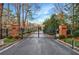 Gated entrance to community with brick pillars and decorative signage at 3456 Paces Nw Pl, Atlanta, GA 30327