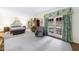 Spacious main bedroom with balcony access, natural light, and elegant furnishings at 3456 Paces Nw Pl, Atlanta, GA 30327