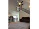 Open floor plan features a staircase and a living area with high ceilings and comfortable seating at 457 Panhandle Pl, Hampton, GA 30228