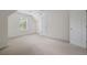 Bedroom with carpet, white walls, and two doors at 237 River Pass Ct, Dacula, GA 30019
