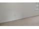 Bright bedroom featuring neutral carpeting and a window providing natural light at 237 River Pass Ct, Dacula, GA 30019