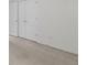 This bedroom offers closet spaces, neutral walls, and plush carpeting at 237 River Pass Ct, Dacula, GA 30019