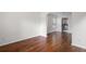 Dining room showcases hardwood floors, wainscoting, and chandelier at 237 River Pass Ct, Dacula, GA 30019