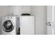 Laundry room with a washing machine and dryer at 237 River Pass Ct, Dacula, GA 30019