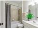 Bathroom with tiled shower, tub and vanity at 3153 Daleview Sw Way, Atlanta, GA 30331