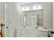 Bathroom with dual sinks and a view of the bedroom at 3153 Daleview Sw Way, Atlanta, GA 30331