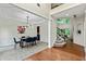 Formal dining area with chandelier, coffered ceilings, and hardwood floors at 3153 Daleview Sw Way, Atlanta, GA 30331