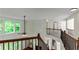 Spacious foyer with staircase and wood railing at 3153 Daleview Sw Way, Atlanta, GA 30331