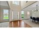 Spacious foyer with hardwood flooring, high ceilings, and bright natural light at 3153 Daleview Sw Way, Atlanta, GA 30331