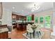 Well-lit kitchen with a center island, stainless steel appliances, and a cozy breakfast nook at 3153 Daleview Sw Way, Atlanta, GA 30331