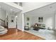 Open-concept living room with modern furniture and lots of natural light at 3153 Daleview Sw Way, Atlanta, GA 30331