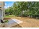 Expansive backyard with a patio and ample space for outdoor activities and gardening at 411 Sugar Maple Ct, Canton, GA 30114