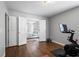View of exercise room through double doors into spacious bedroom at 411 Sugar Maple Ct, Canton, GA 30114