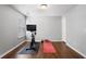 Home exercise room with wood floors and large windows for ample light at 411 Sugar Maple Ct, Canton, GA 30114