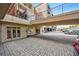 Covered entrance with stone tile, glass doors, and easy access to parking, providing convenience at 560 Dutch Valley Ne Rd # 2207, Atlanta, GA 30324