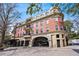 Striking exterior view of a brick building with balconies and unique architectural details at 560 Dutch Valley Ne Rd # 2207, Atlanta, GA 30324