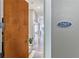 The main entrance to unit #2207 and a view down a long interior hallway at 560 Dutch Valley Ne Rd # 2207, Atlanta, GA 30324