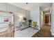Beautiful hallway with wooden floors, decorative trim, console table and a large mirror at 560 Dutch Valley Ne Rd # 2207, Atlanta, GA 30324