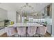 Stylish kitchen island with marble countertop, stainless steel appliances, and elegant chandelier at 560 Dutch Valley Ne Rd # 2207, Atlanta, GA 30324