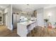 Modern kitchen with stainless steel appliances, a marble countertop island, and an open layout at 560 Dutch Valley Ne Rd # 2207, Atlanta, GA 30324