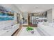 Living room with modern decor offers an open floor plan with a view to kitchen and dining area at 560 Dutch Valley Ne Rd # 2207, Atlanta, GA 30324