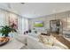 Living room showcases modern decor, a comfortable sectional, and a large entertainment center at 560 Dutch Valley Ne Rd # 2207, Atlanta, GA 30324