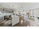 Bright and airy living room featuring a modern kitchen and elegant decor, creating a welcoming atmosphere at 560 Dutch Valley Ne Rd # 2207, Atlanta, GA 30324