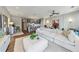 Open-concept living space shows a modern design with view to the kitchen and bar seating at 560 Dutch Valley Ne Rd # 2207, Atlanta, GA 30324