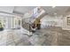 Tiled lobby with a winding staircase, entrance doors, and mailboxes at 560 Dutch Valley Ne Rd # 2207, Atlanta, GA 30324