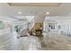 Bright lobby area featuring tiled floors, a curved staircase, and mailboxes at 560 Dutch Valley Ne Rd # 2207, Atlanta, GA 30324