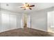 Bedroom with carpet floors, double closets, and a ceiling fan with light at 2830 Knollview Dr, Decatur, GA 30034