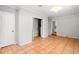 Living area with tile flooring, access to laundry room and kitchen at 2830 Knollview Dr, Decatur, GA 30034