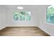 Bright bedroom with large windows offering natural light and scenic views at 3144 Corner Oak Dr, Norcross, GA 30071