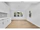 Dining area featuring hardwood floors, neutral colors, and natural light at 3144 Corner Oak Dr, Norcross, GA 30071