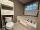 Bathroom with a jetted tub and tile flooring at 608 Fairhaven Blvd, Stockbridge, GA 30281
