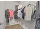 This walk-in closet features a carpeted floor, wire shelving, and hanging storage at 14 Jacobs Farm Ln # 7, Lawrenceville, GA 30045