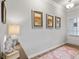 Bright foyer featuring stylish decor, wood flooring and a front door with sidelight at 14 Jacobs Farm Ln # 7, Lawrenceville, GA 30045