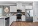 Bright kitchen features stainless steel appliances and ample cabinet space at 14 Jacobs Farm Ln # 7, Lawrenceville, GA 30045
