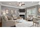Inviting living room with a fireplace, ceiling fan, and comfortable seating at 14 Jacobs Farm Ln # 7, Lawrenceville, GA 30045