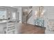 Open concept living area featuring wood floors, stylish decor, and natural light at 14 Jacobs Farm Ln # 7, Lawrenceville, GA 30045